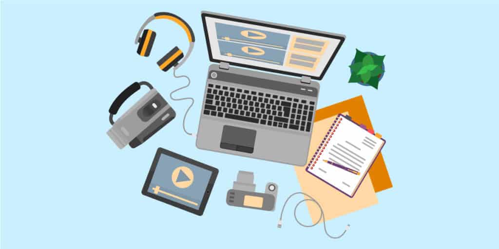 Illustration of a workspace with a laptop, headphones, notebook, tablet, projector, camera, memory card, USB flash drive, charging cable, and a small potted plant on a light blue background.